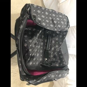 Paris Hilton traveling roller bag